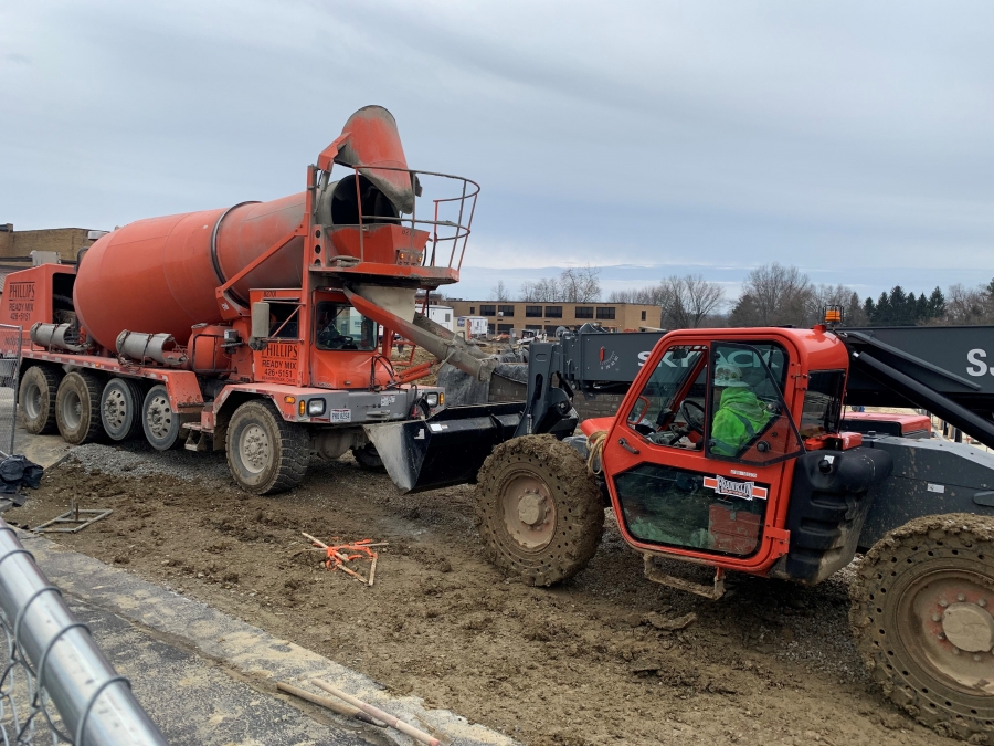 concrete mixer truck and skyjack